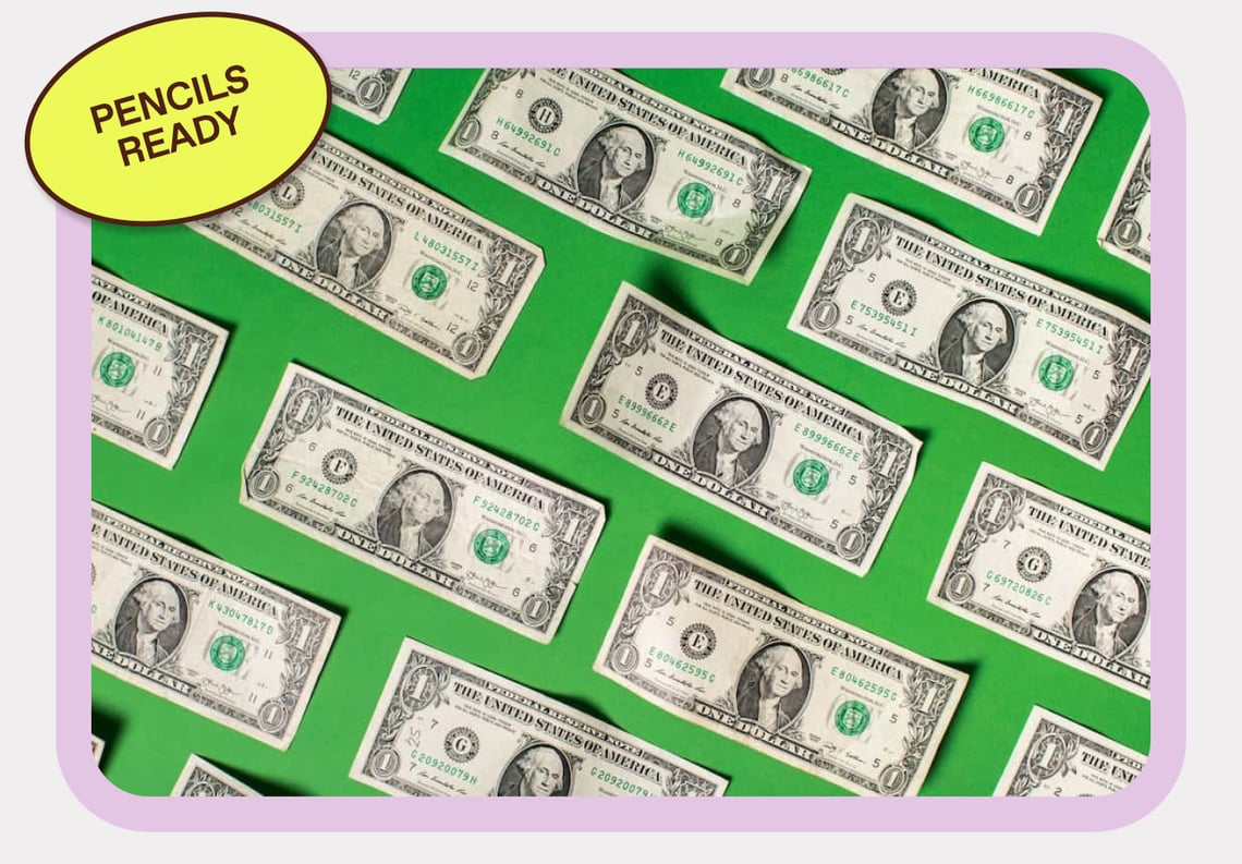 American $1 bills laid out neatly on a green background